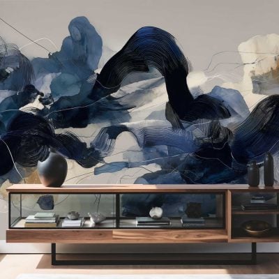 Large abstract mural wallpaper features dynamic swirls and bold strokes of deep blue, black, and hints of white. The design is expressive with brush-like textures, creating a sense of energy and movement. The contrasting dark and cool tones make the wall a striking focal point in the room.