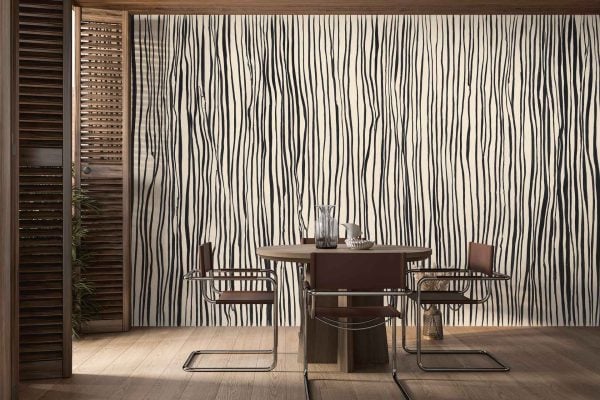 White wall wallpaper with bold black, wavy vertical lines resembling abstract wood grain; minimalist, modern pattern with high contrast black on white.