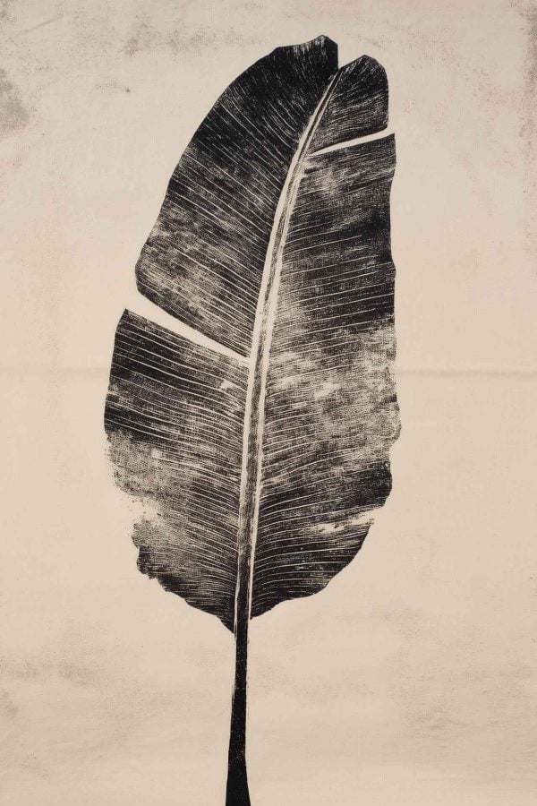 Plain light-colored wallpaper with a subtle, vintage look serves as the background, featuring soft monochrome tones. No patterns or designs are present except gentle texture that complements banana leaf art.