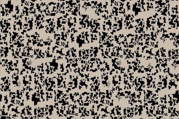 Beige wallpaper with scattered irregular black speckles and blotches, forming an abstract camo-style pattern. No distinct shapes or symmetry.