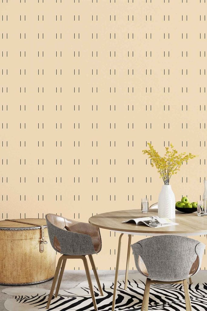 Beige wallpaper with a minimalist black dash pattern provides a subtle, modern backdrop. The linear black dashes on the soft beige background create visual interest and a contemporary look.