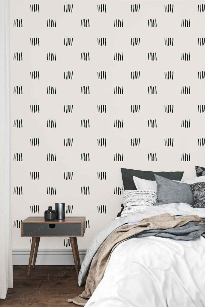 White and black abstract patterned wallpaper featuring bold geometric shapes stands out as the striking accent wall in a modern bedroom. The wallpaper’s high-contrast design draws attention with its dynamic mix of swirling lines and sharp angles in monochrome tones.