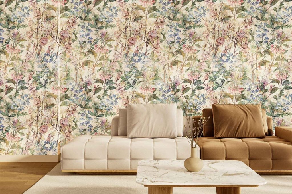Blushing Bride floral wallpaper featuring soft pink blooms, delicate green leaves, and subtle cream accents; the design adds romantic, botanical charm to the living room.