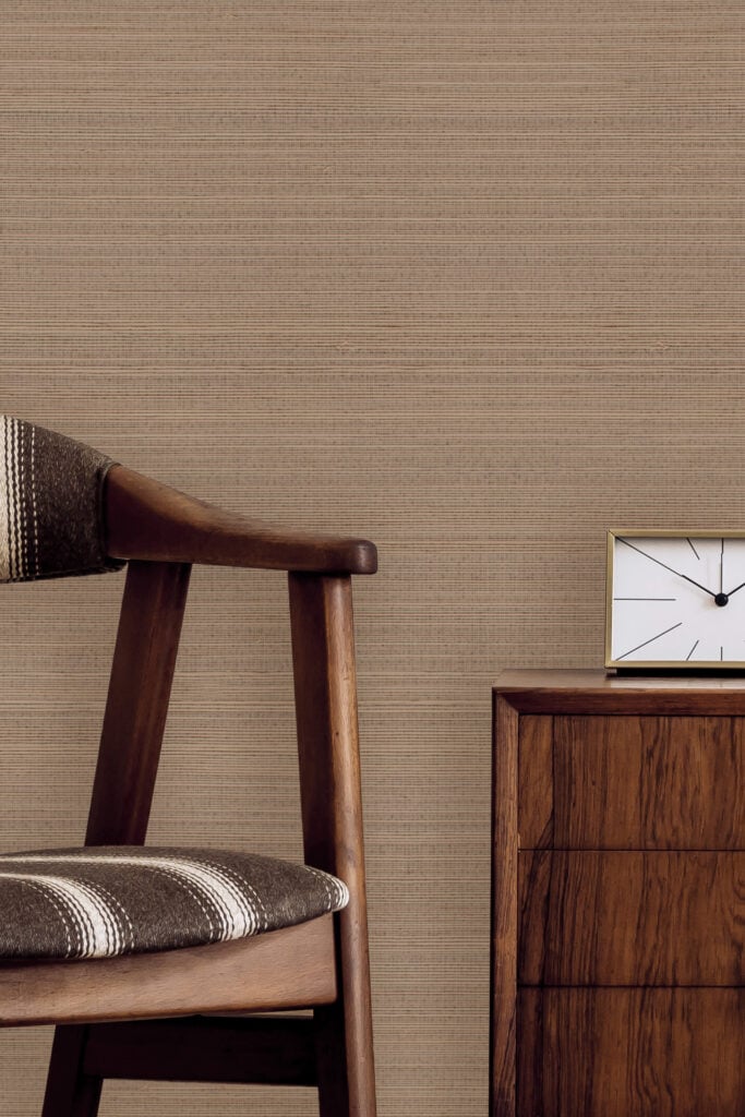 Beige textured wallpaper with subtle patterns forms the background; its neutral tones and tactile finish are prominent.