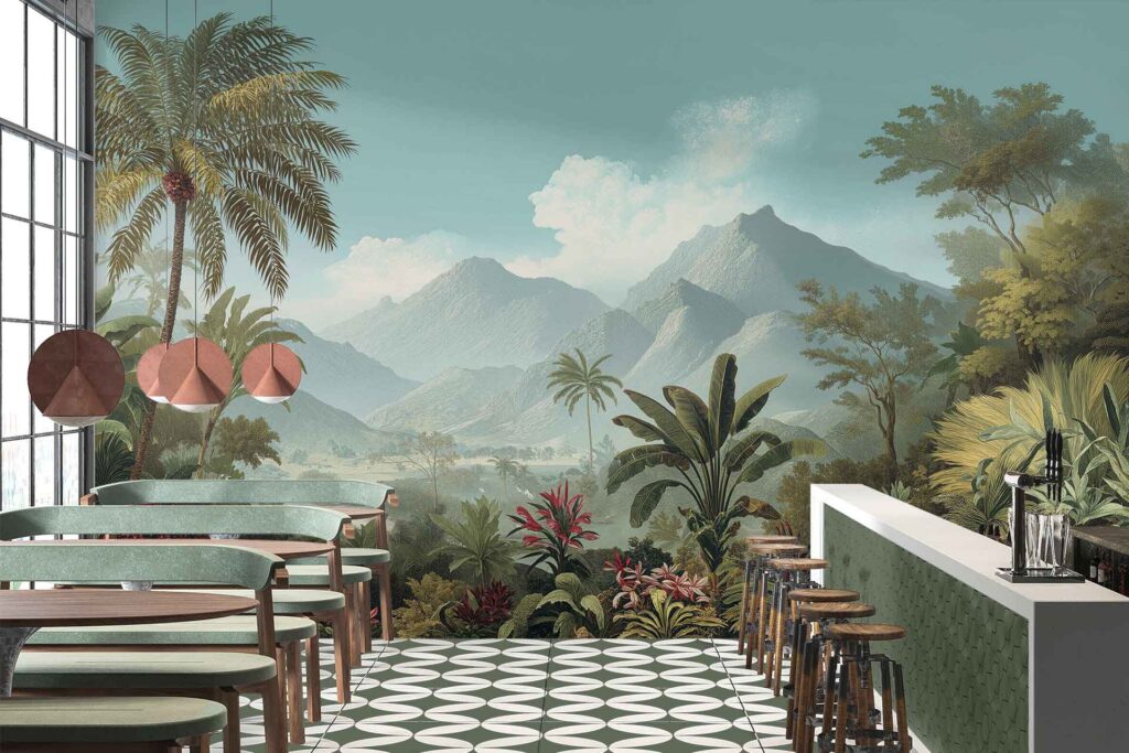 Large mural wallpaper featuring lush tropical plants in vibrant greens and distant mountains under a bright blue sky, adding color and nature-inspired elements to the café wall.