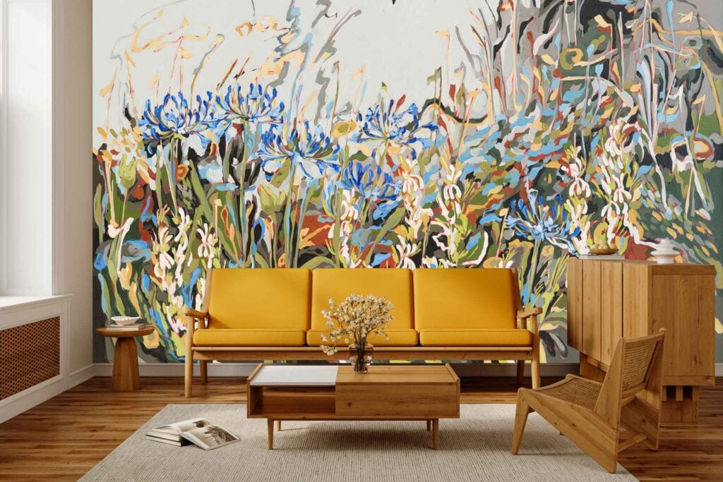 Large floral wallpaper mural with blue, white, and red flowers surrounded by green foliage. Colorful botanical patterns dominate the wall.