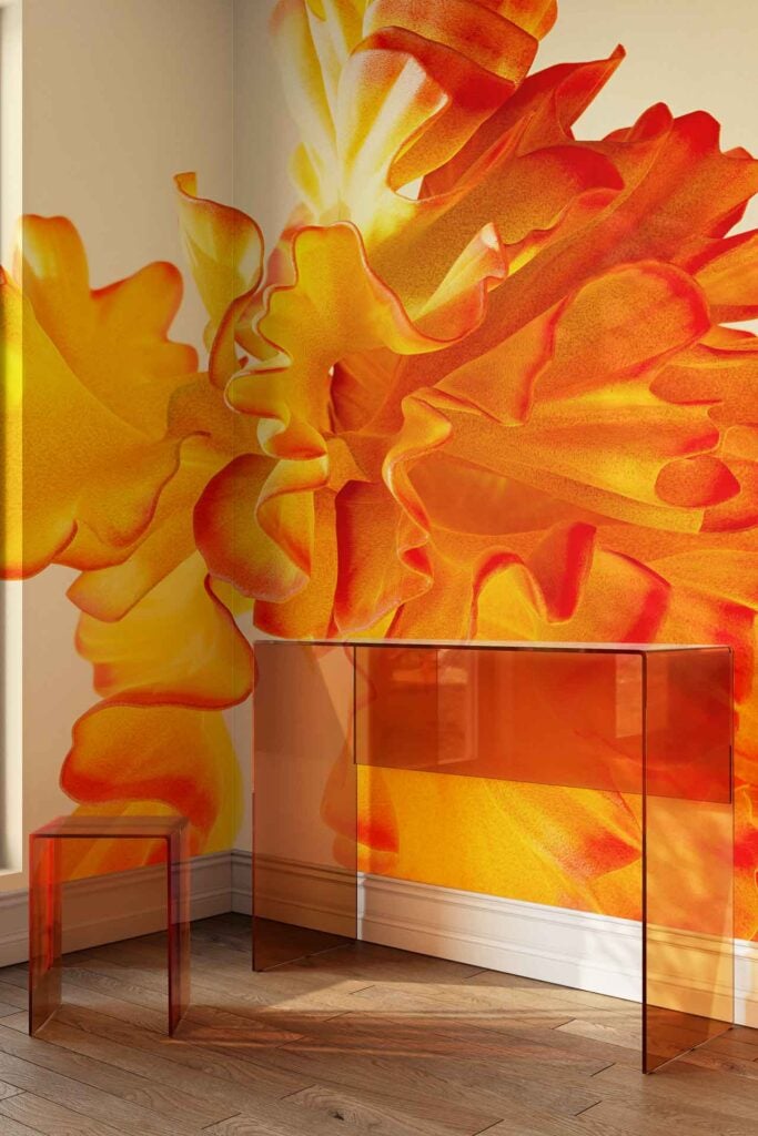 Large mural wallpaper with vivid yellow and orange floral patterns featuring bold petals and blossoms fills the wall.