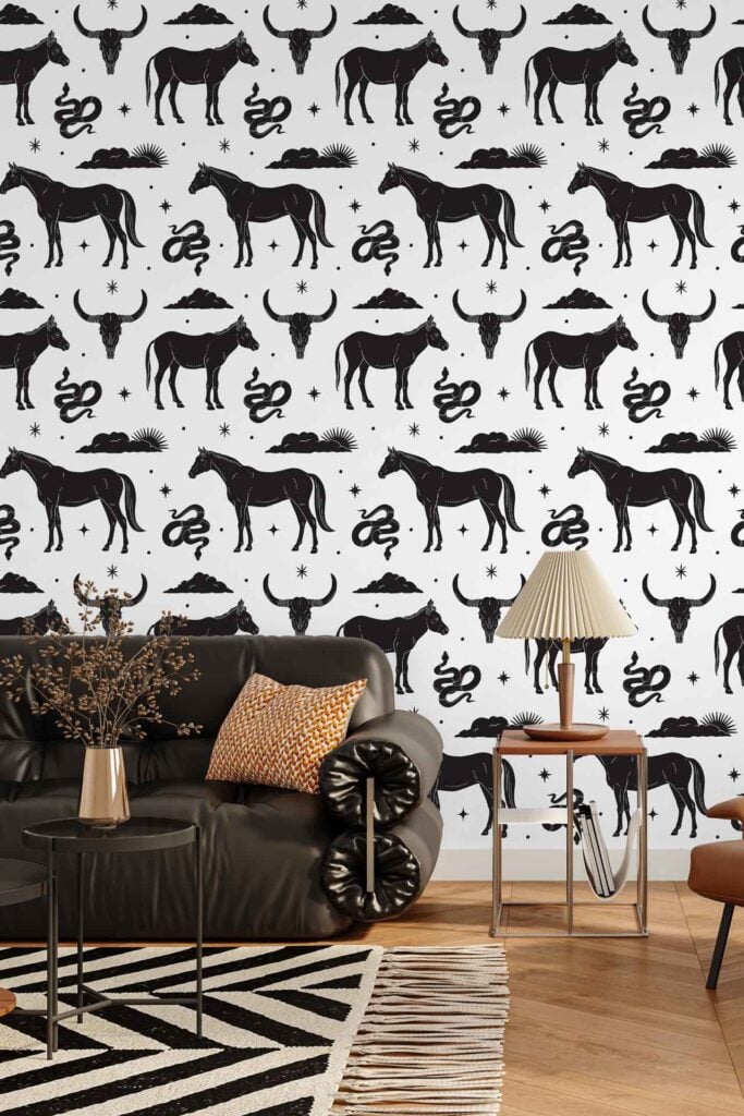 Wallpaper featuring bold Left Of Centre designs including horses, clouds, snakes, and suns in striking colors on a white background.