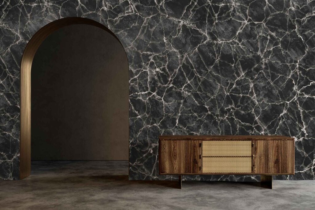 Dark marble wallpaper with striking white veining, featuring a bold contrast of black and white tones.