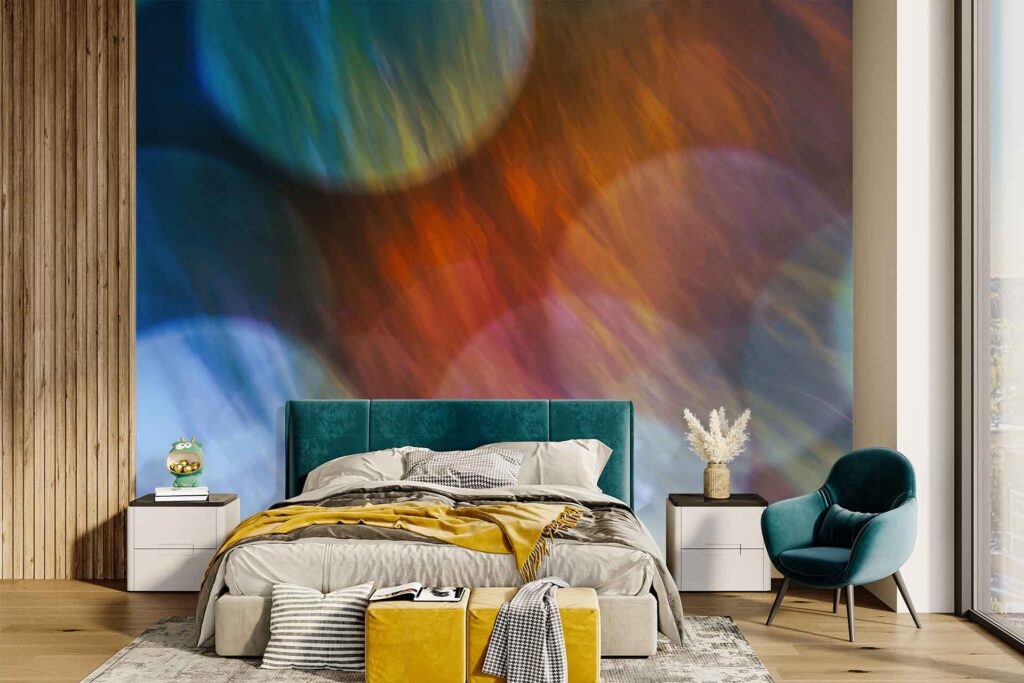 Large abstract mural wallpaper behind the bed features bold blue, orange, and purple circles.