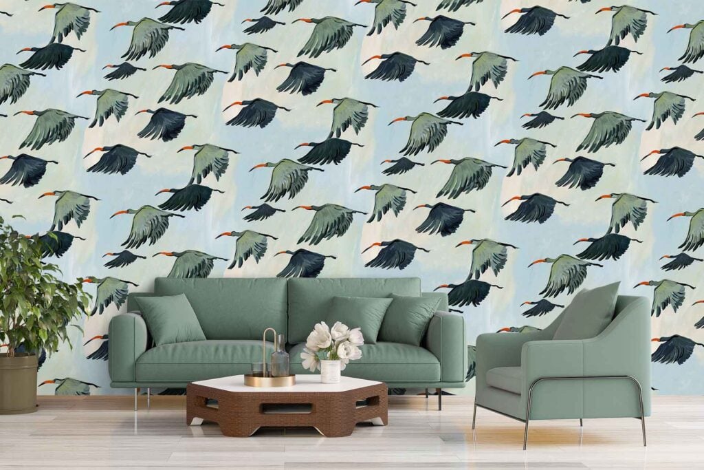 Wallpaper featuring white cranes flying and soaring with outstretched wings, paths diverging beneath them, all set against a soft blue sky background.