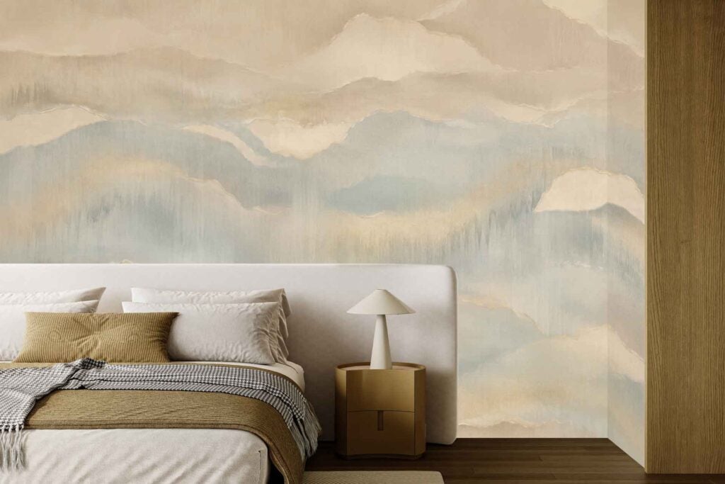 Abstract wall mural featuring soft beige and blue tones, depicting cloud-like shapes and gentle, dreamy patterns.