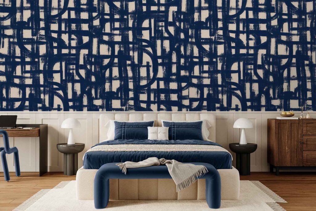 Blue abstract patterned accent wall featuring swirling shapes and varying shades of blue and white, adding a modern artistic touch to the bedroom décor.