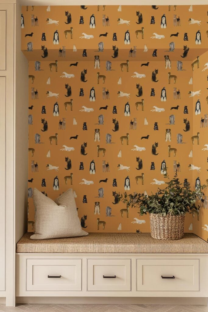 Mustard yellow wallpaper adorned with whimsical illustrations of dogs and cats in various playful poses; the animal patterns and warm tones stand out as the main decorative element.