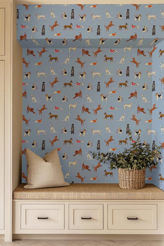Blue wallpaper decorated with playful dog illustrations in various poses, featuring a mix of brown, white, and black dogs and subtle paw print details on a soft blue background.