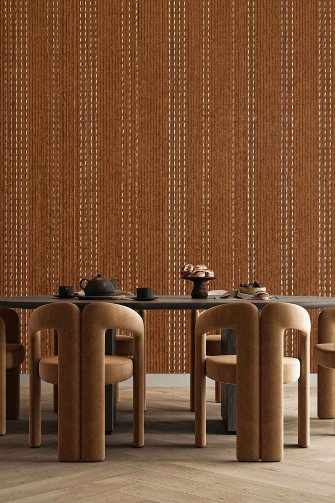 The wallpaper is brown with vertical rows of dotted patterns, creating a textured look reminiscent of a subtle drip effect. The design consists mainly of earthy tones and repeating dotted lines.