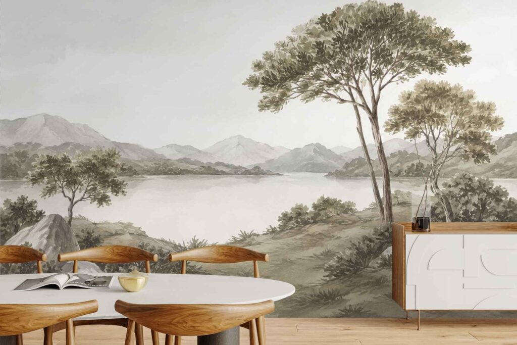 Wall mural features a serene landscape with trees, a calm lake, and distant mountains in soft, muted tones; colors include gentle greens, blues, and grays.