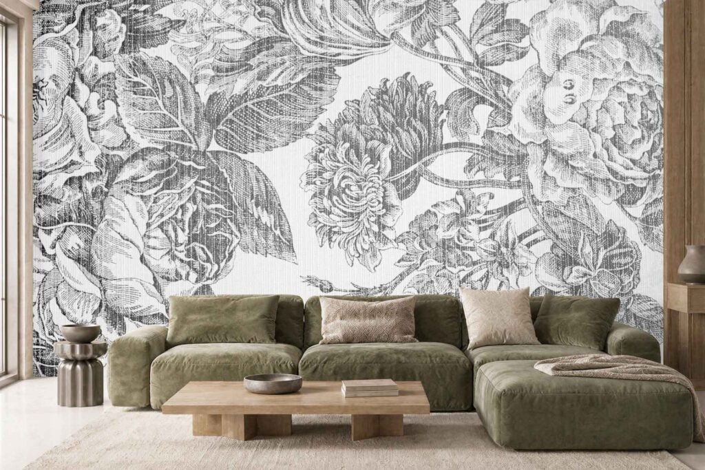 A striking black-and-white floral mural dominates the wall, featuring large, detailed flowers in dramatic monochrome shades. The wallpaper’s bold contrast and intricate botanical patterns are the visual focal point of the room.