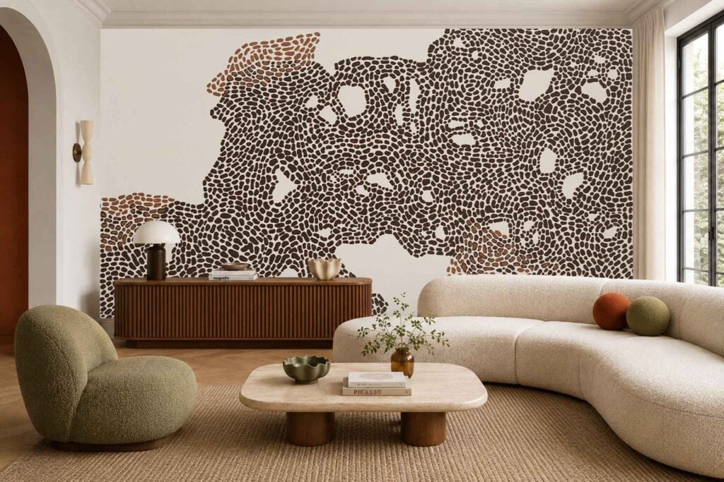 The wallpaper on the back wall features an abstract mural with black and brown dots, creating a modern, artistic pattern.