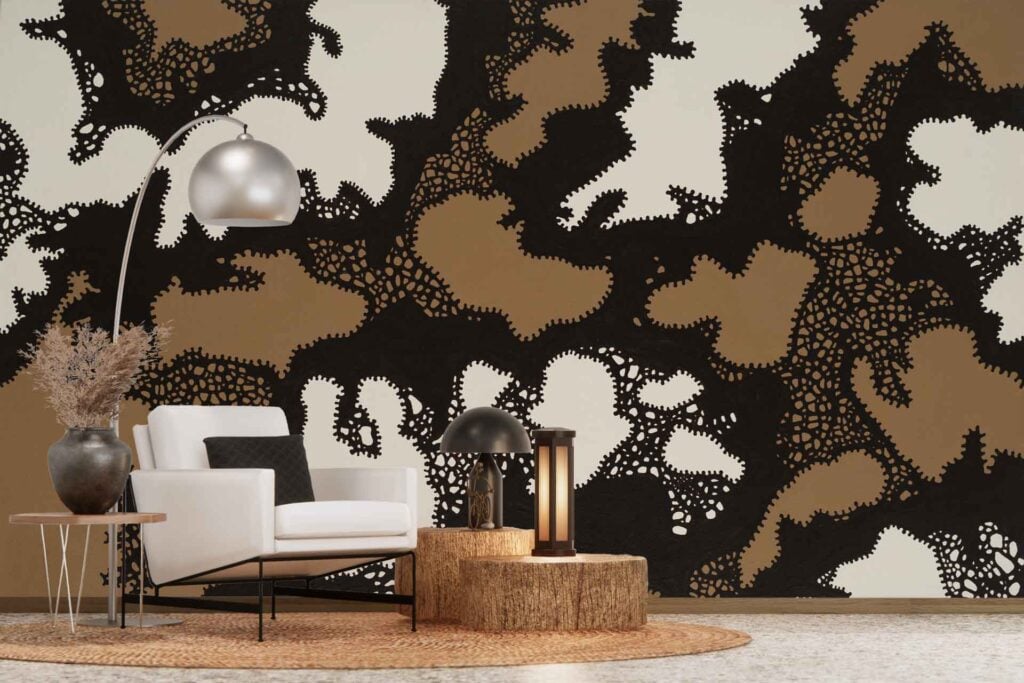 Abstract wallpaper with bold patterns in black, brown, and beige creates a striking backdrop. The design features organic shapes and geometric elements that add texture and visual interest to the living room’s wall.