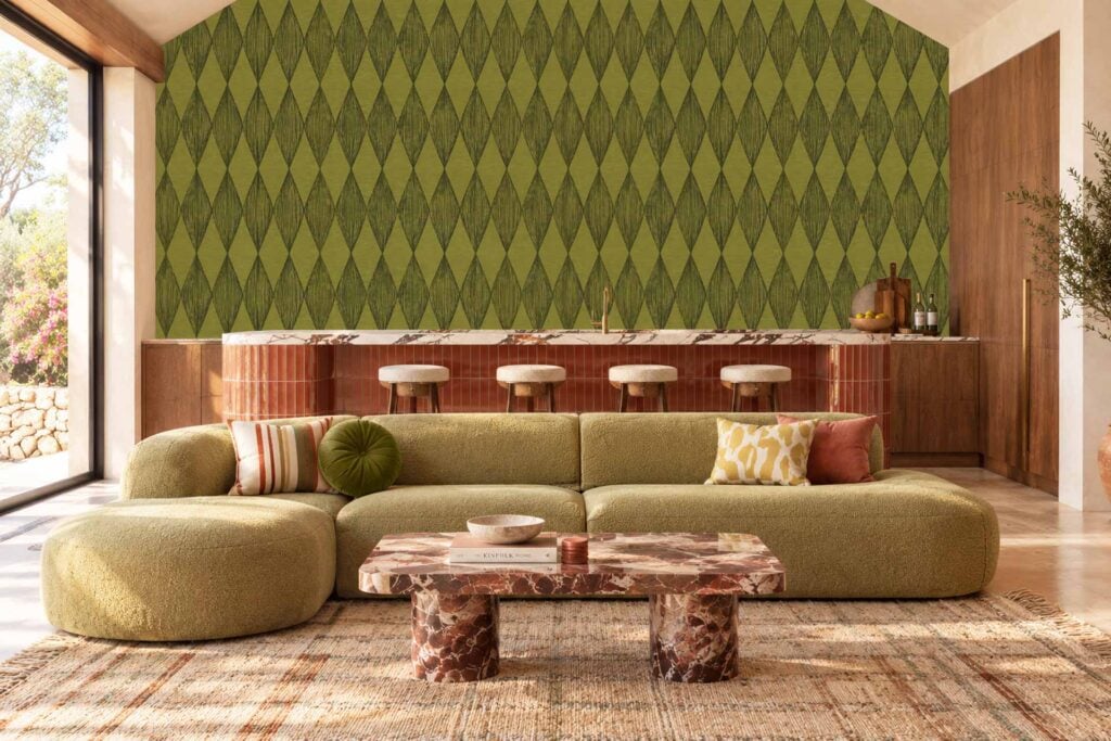 Green diamond-patterned wallpaper with layered, calming tones covers the back wall. The repeating diamond shapes and soothing green hues make the wallpaper a standout element in the room.