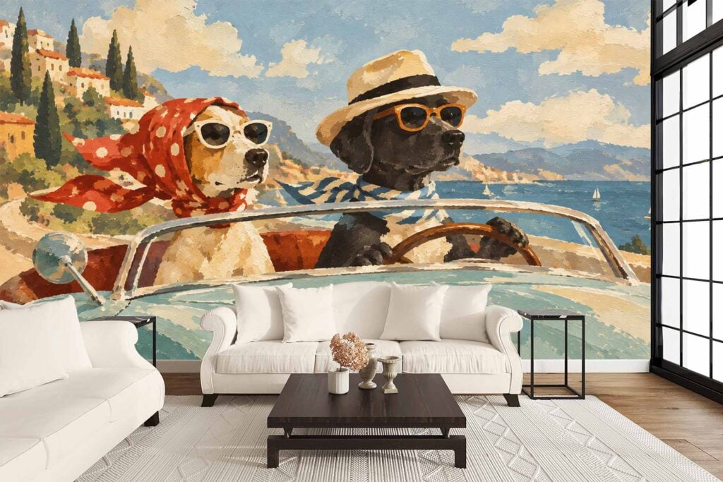 Wallpaper mural features two dogs in a convertible by the sea—one wears a hat, sunglasses, striped scarf; the other has sunglasses and a red polka-dot scarf. Background includes ocean and sky, with blue, red, white, and tan colors.